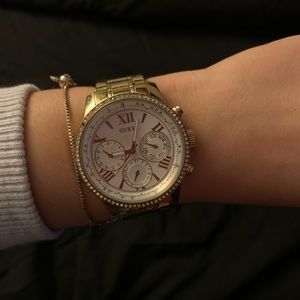 Women’s gold guess watch